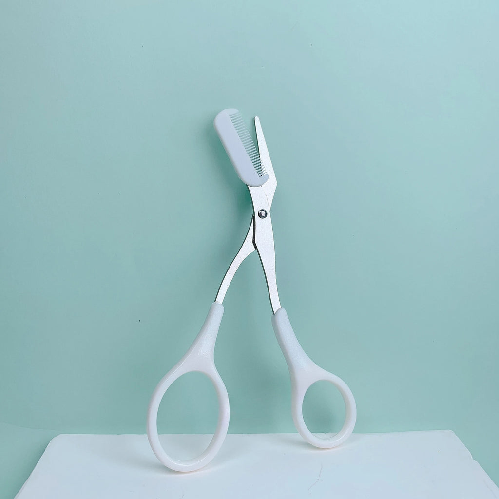 Pink eyebrow trimming scissors with built-in comb - stainless steel, creating perfect eyebrows